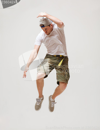 Image of male dancer jumping in the air