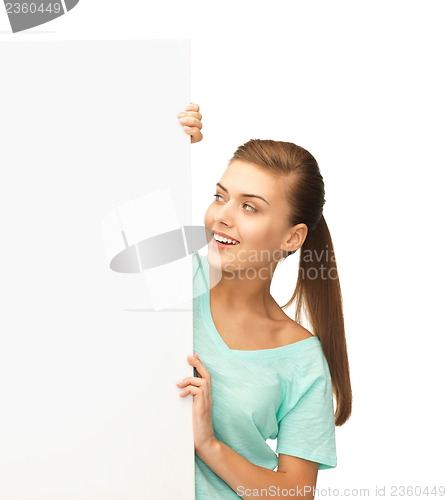 Image of woman with white blank board