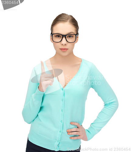 Image of girl showing warning gesture