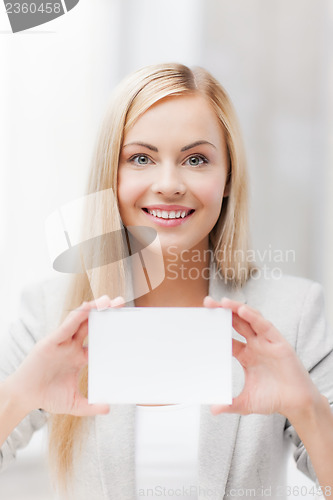 Image of woman with blank business or name card