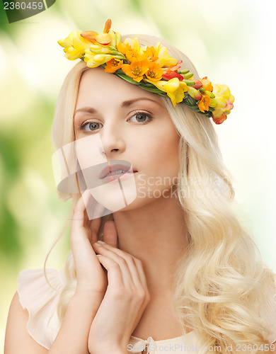 Image of woman wearing wreath of flowers