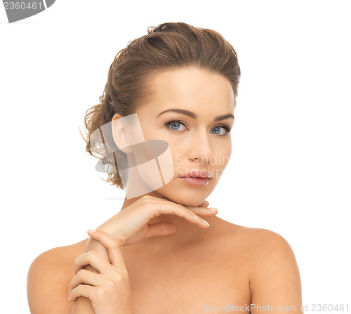Image of face and hands of beautiful woman
