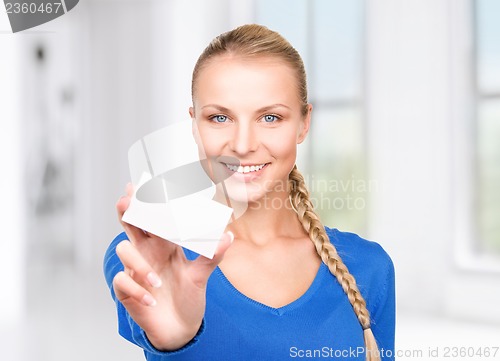 Image of happy woman with business card