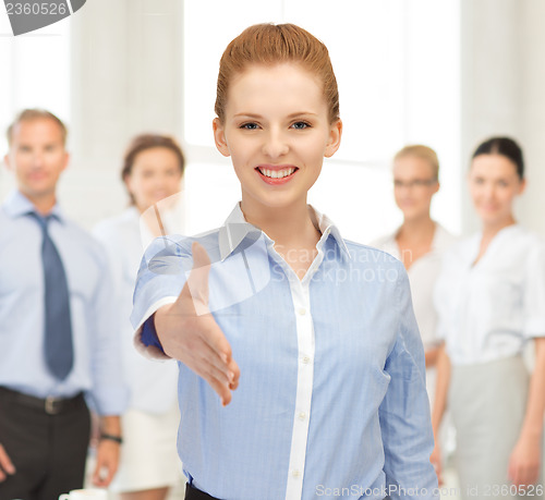 Image of woman with an open hand ready for handshake