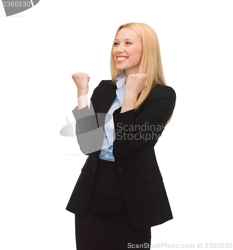 Image of happy woman with hands up