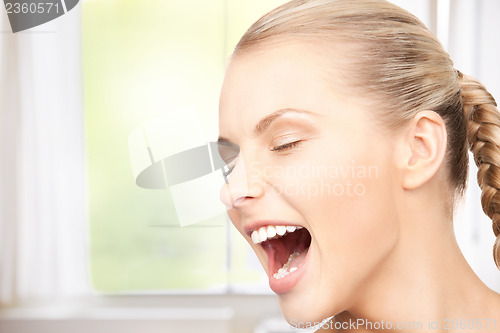 Image of screaming woman