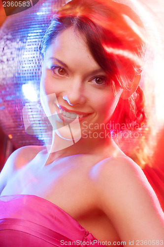 Image of woman with disco ball