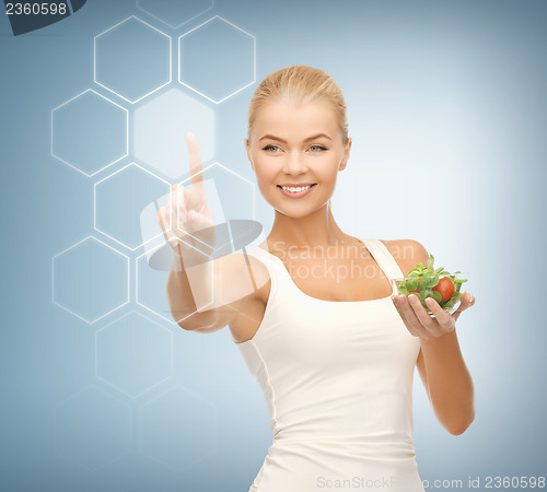 Image of woman with salad and virtual screen