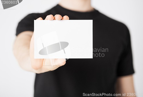 Image of man hand with blank paper