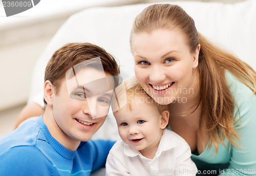 Image of happy family with adorable baby