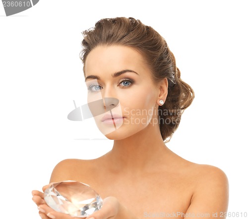 Image of woman showing big diamond