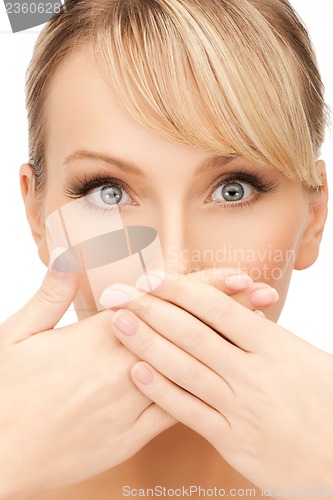 Image of woman covering her mouth