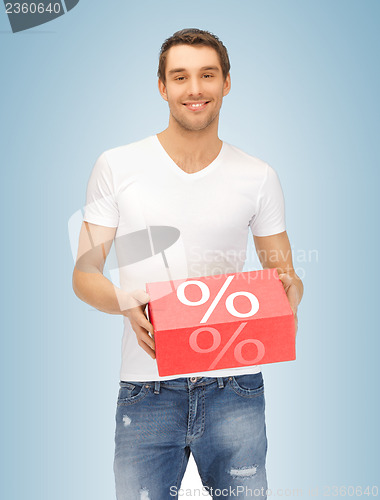 Image of man with big percent box