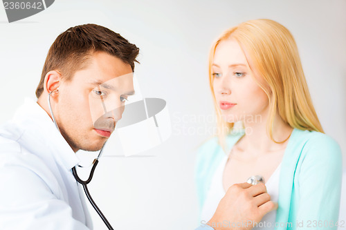 Image of male doctor with patient