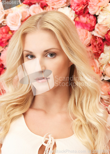 Image of woman with  background full of roses