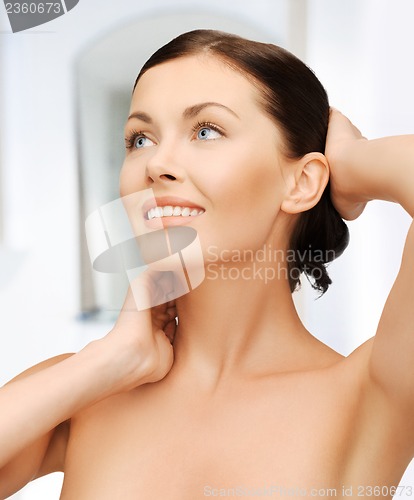 Image of face and hands of beautiful woman