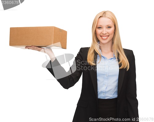 Image of businesswoman delivering cardboard box