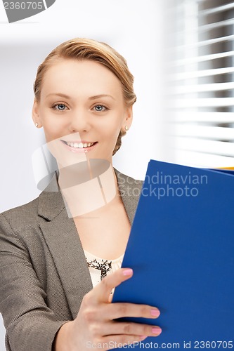 Image of woman with folders