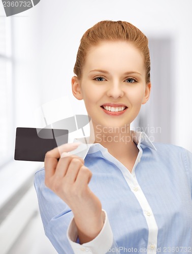 Image of happy woman with credit card