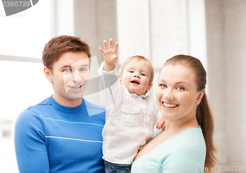 Image of happy family with adorable baby