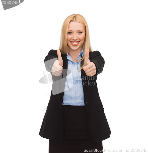 Image of young businesswoman with thumbs up