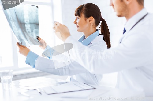 Image of doctor and nurse exploring x-ray