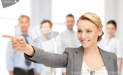 Image of businesswoman pointing her finger