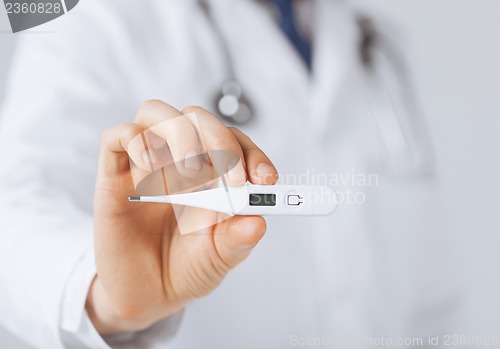 Image of male doctor with thermometer