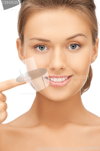 Image of woman showing her teeth