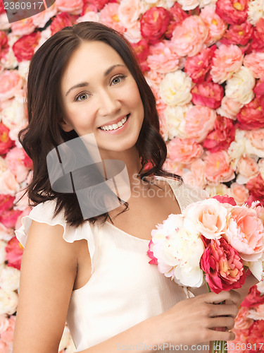 Image of woman with background full of roses