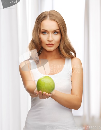 Image of woman with green apple