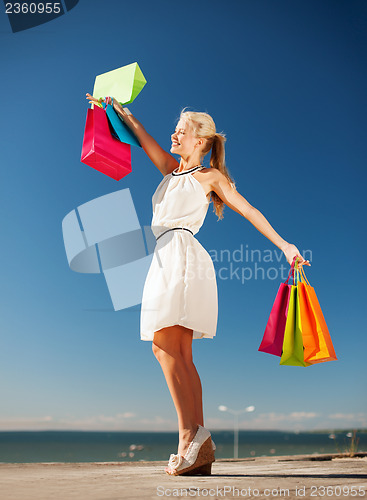 Image of woman with shopping bags