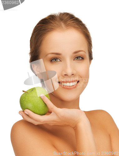Image of smiling woman with an apple