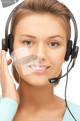 Image of friendly female helpline operator