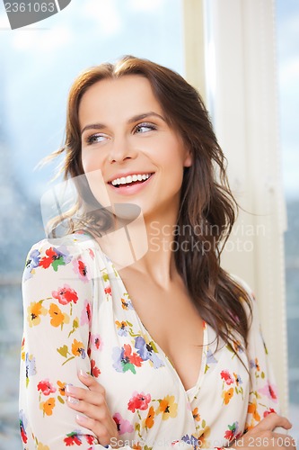 Image of picture of smiling woman at home