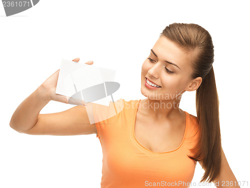 Image of smiling woman holding white blank card