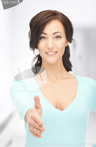 Image of woman with an open hand ready for handshake