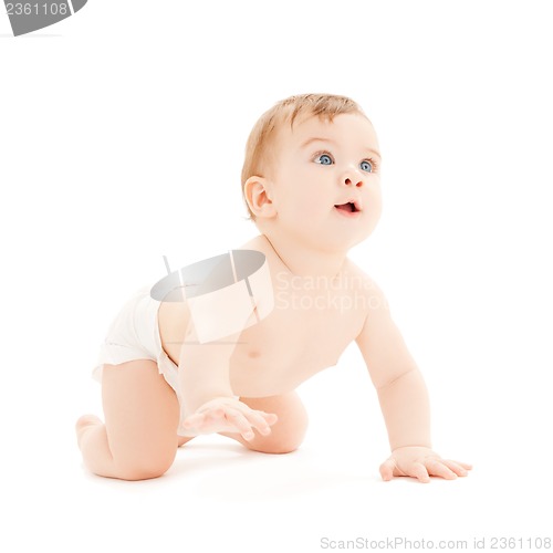 Image of crawling curious baby