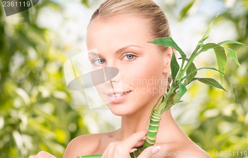 Image of woman with sprout