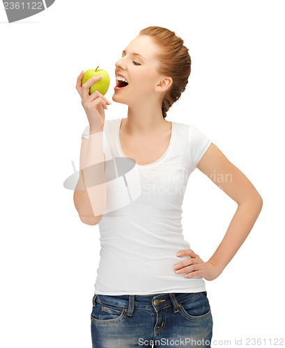 Image of woman in blank t-shirt eating green apple