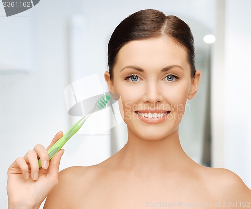Image of woman with toothbrush
