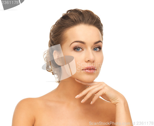 Image of face and hands of beautiful woman