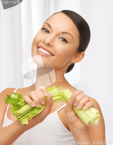 Image of woman with fresh celery