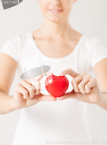 Image of woman hands with heart