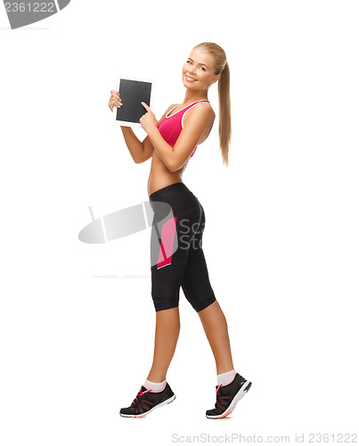 Image of sporty woman with tablet pc