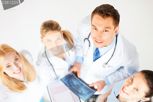 Image of young group of doctors looking at x-ray