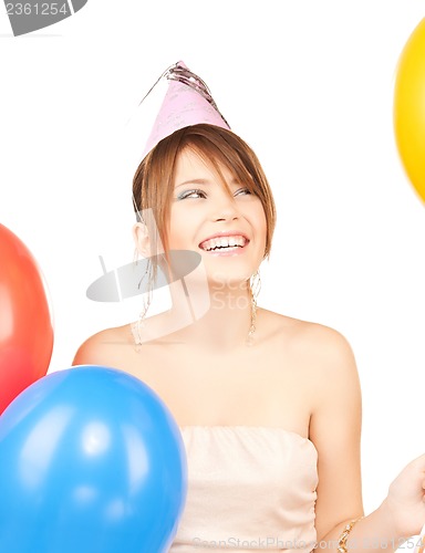 Image of happy girl with colorful balloons