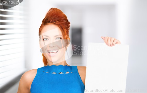 Image of happy woman with blank board