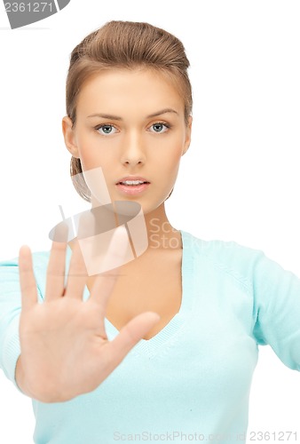 Image of woman making stop gesture