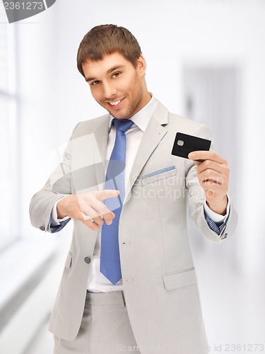 Image of businessman with credit card